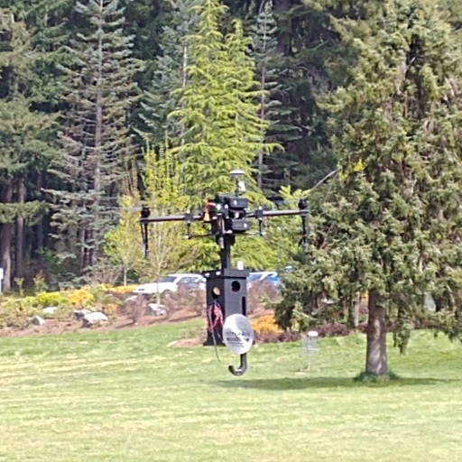 An image of the UAV hovering above the SMU campus